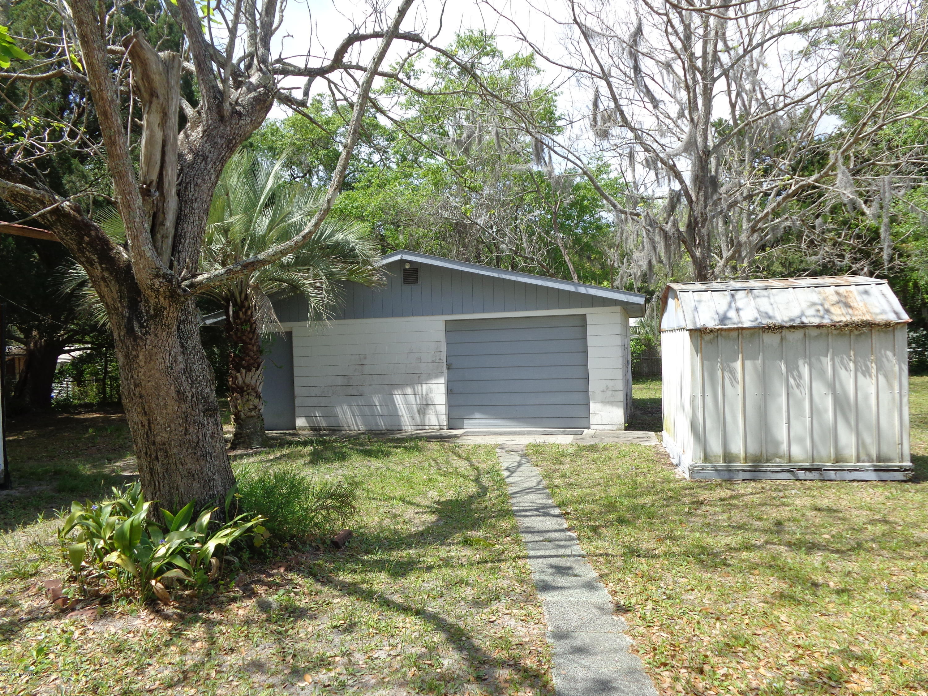 13294 Yellow Bluff Road Jacksonville, FL 32226 - Photo 18 of 21 a house that has a tree in front of it