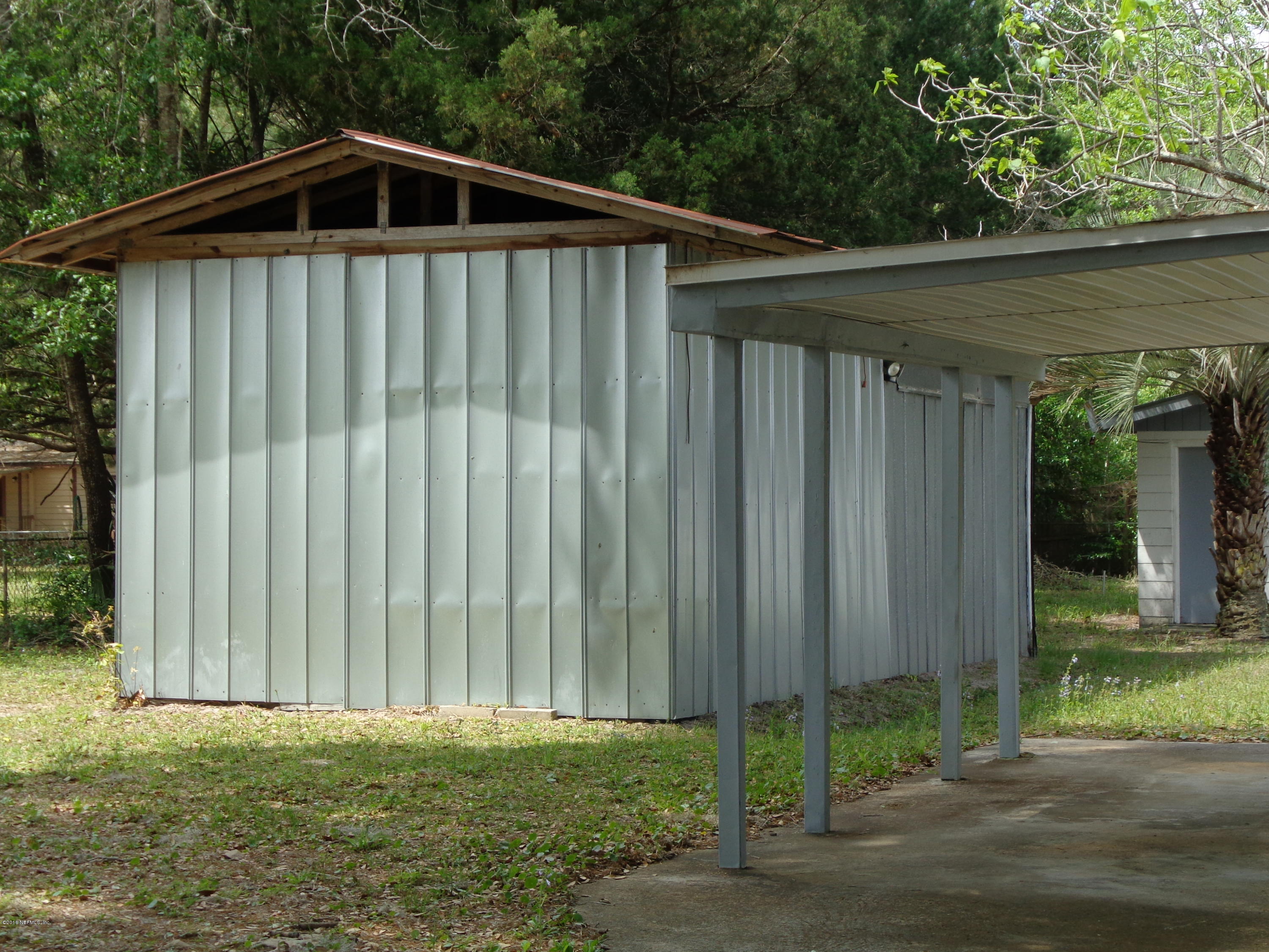 13294 Yellow Bluff Road Jacksonville, FL 32226 - Photo 20 of 21 a backyard of a house with lots of green space