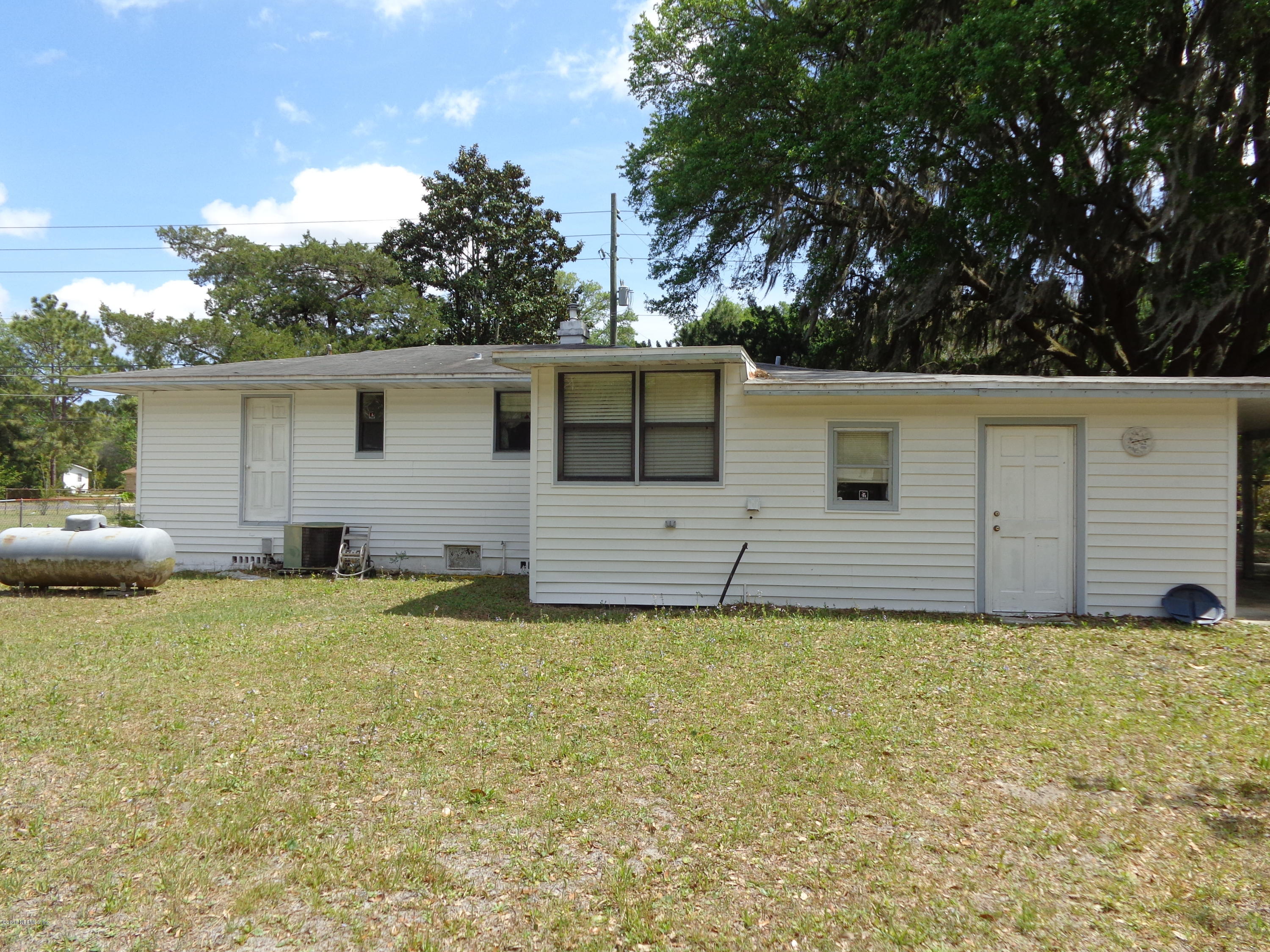 13294 Yellow Bluff Road Jacksonville, FL 32226 - Photo 3 of 21 a view of a house with a yard