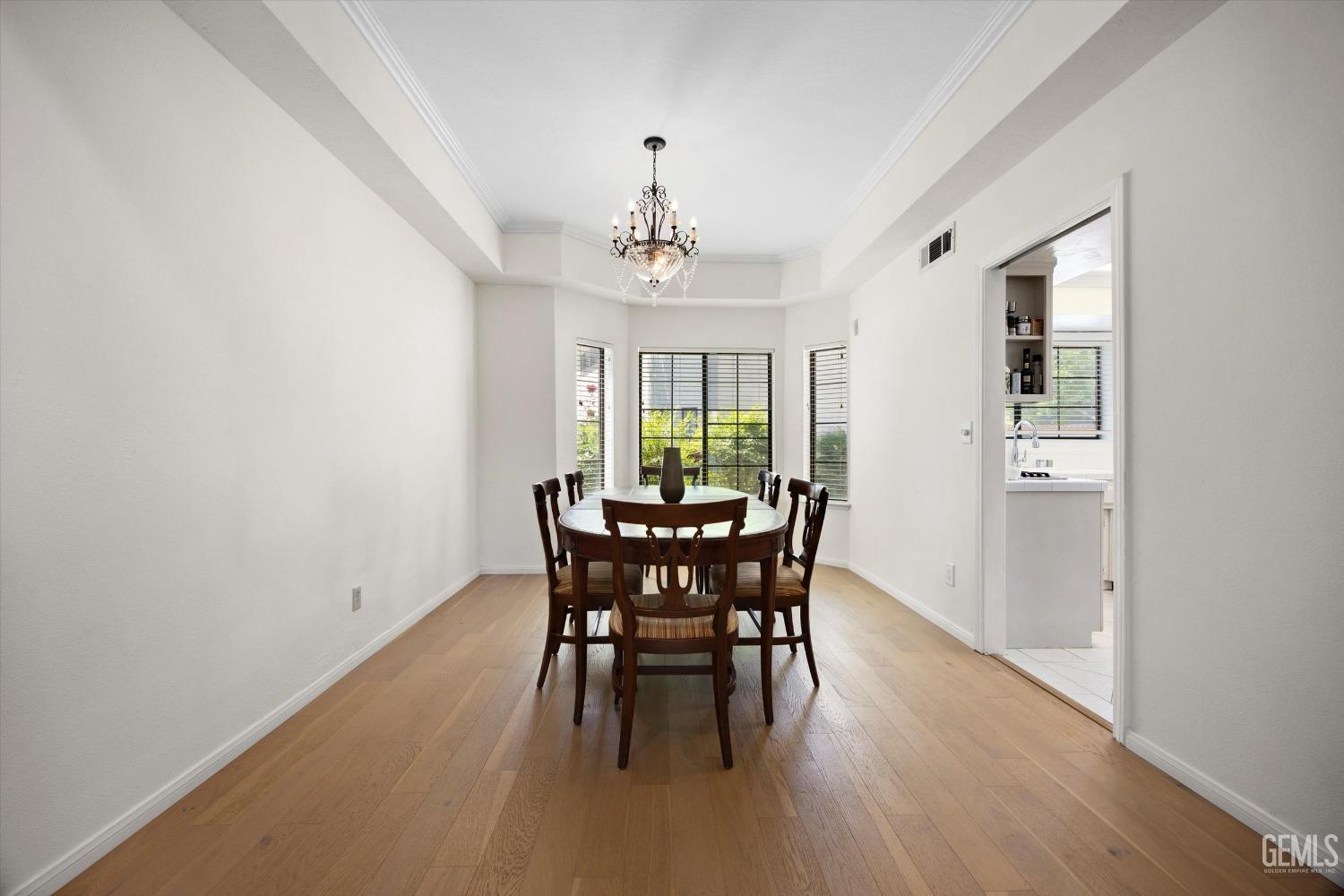 Undisclosed Address Bakersfield, CA 93309 - Photo 13 of 48 a view of a dining room with furniture and window