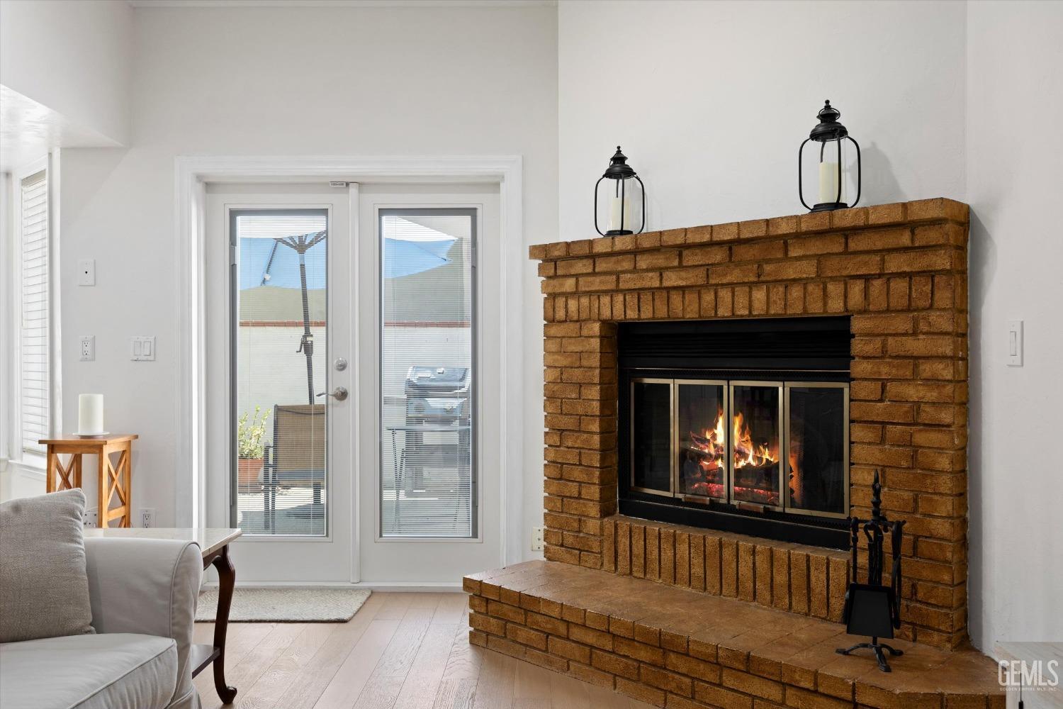 Undisclosed Address Bakersfield, CA 93309 - Photo 16 of 48 a living room with furniture and a fireplace