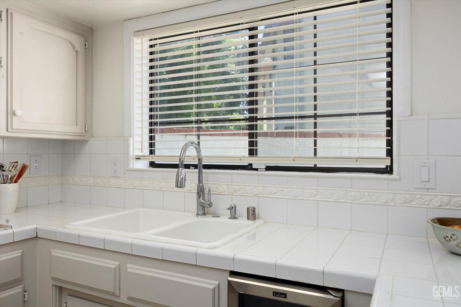 Undisclosed Address Bakersfield, CA 93309 - Photo 20 of 48 a kitchen with a sink and a window