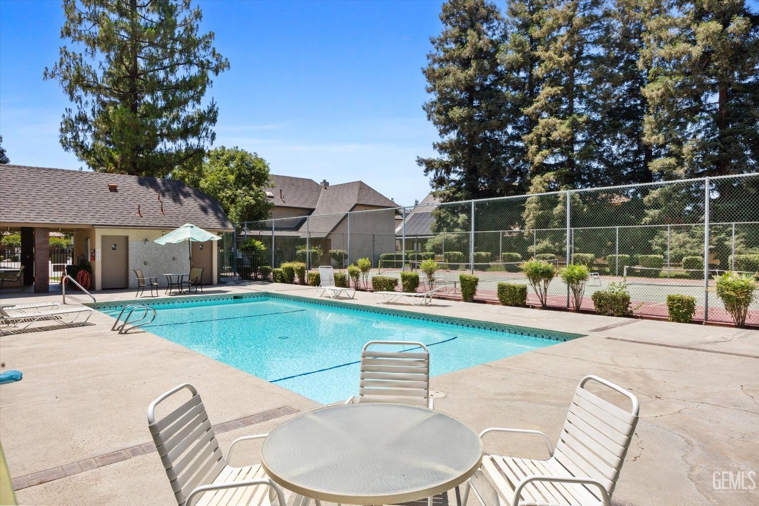 Undisclosed Address Bakersfield, CA 93309 - Photo 40 of 48 a view of a swimming pool with a patio