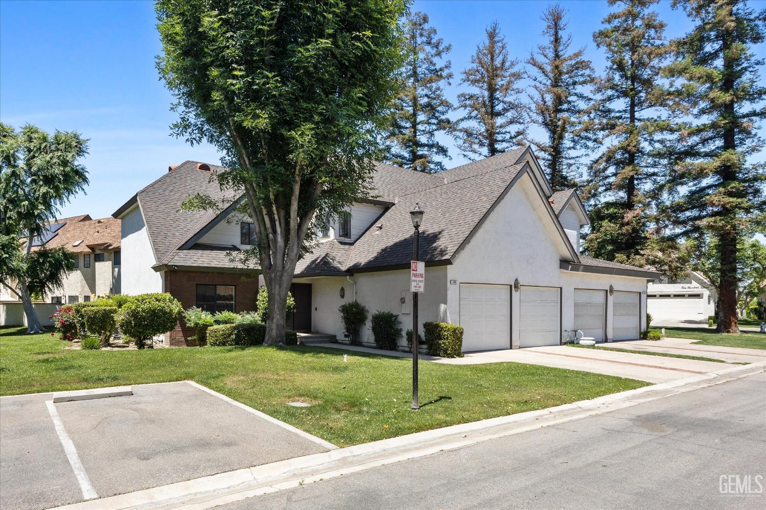 Undisclosed Address Bakersfield, CA 93309 - Photo 42 of 48 a house that has a tree in front of it