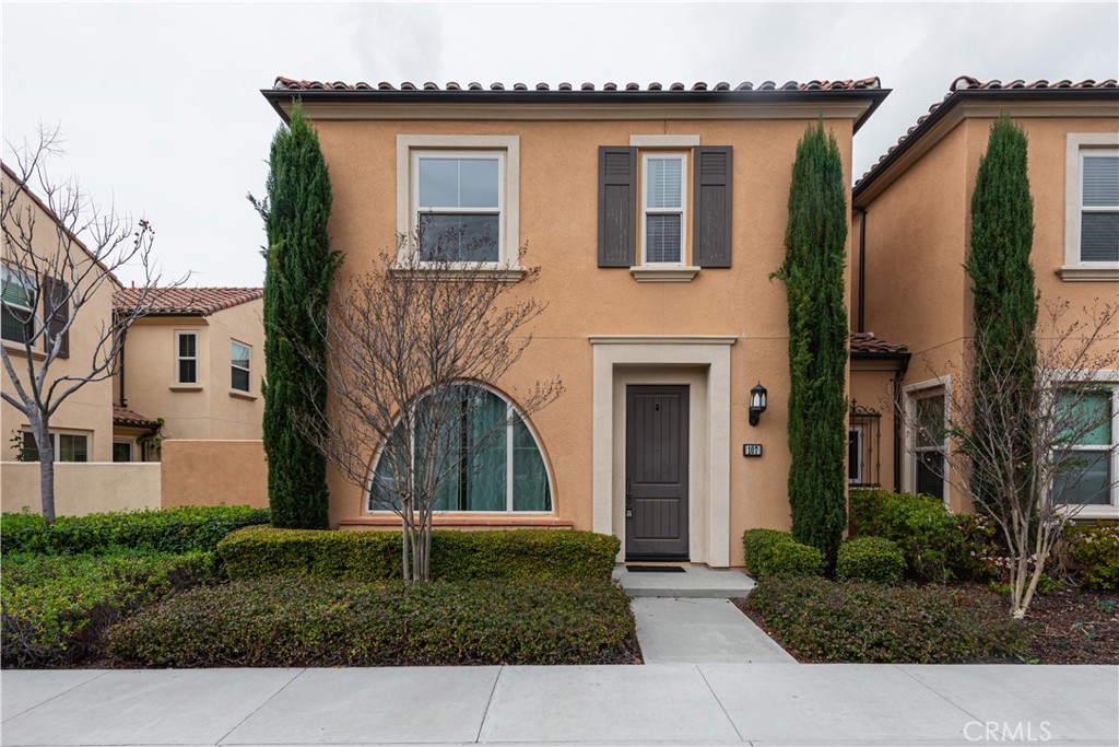 a front view of a house with garage