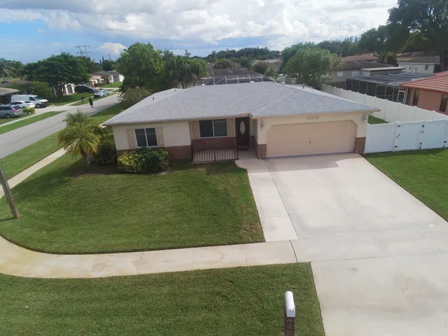 a view of a house with a garden