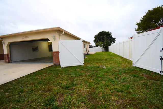 a house view with a garden space