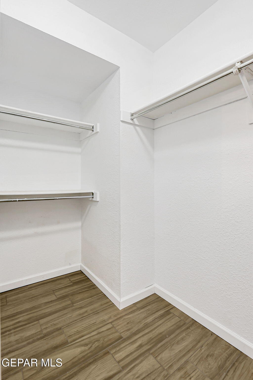 1053 Hillrise Court Las Cruces, NM 88011 - Photo 16 of 53 a view of an empty walk in closet