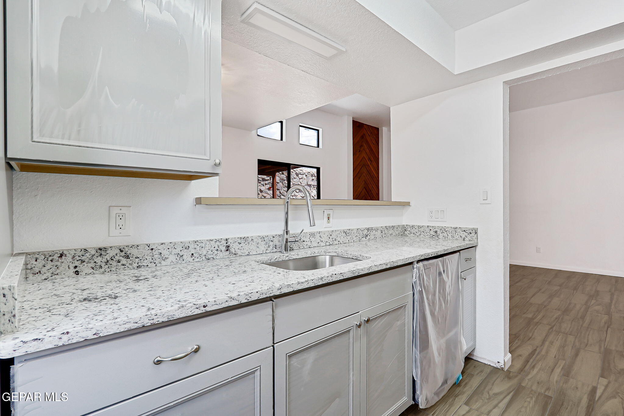 1053 Hillrise Court Las Cruces, NM 88011 - Photo 29 of 53 a bathroom with a sink and a mirror