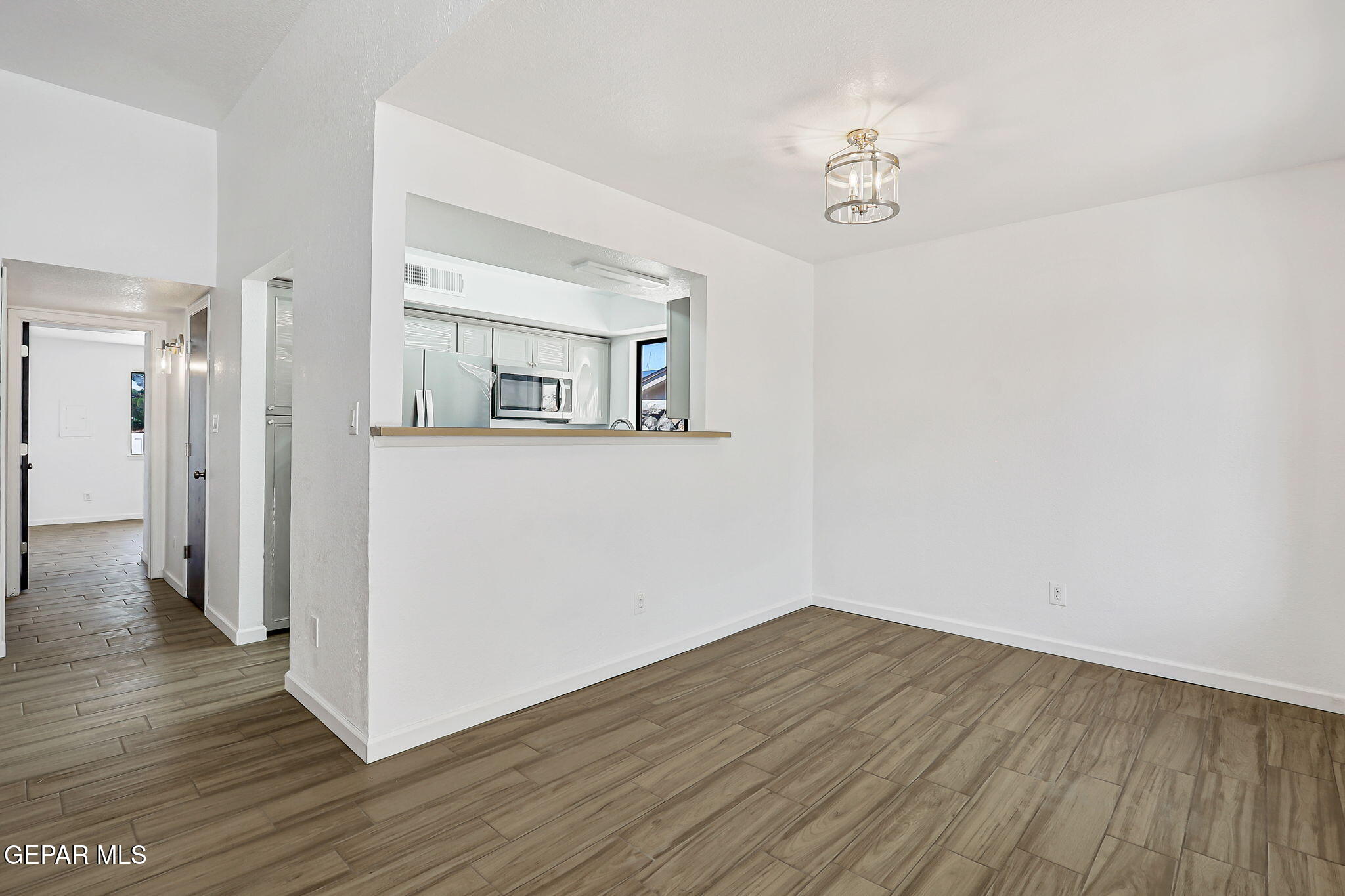 1053 Hillrise Court Las Cruces, NM 88011 - Photo 36 of 53 a view of a room with wooden floor