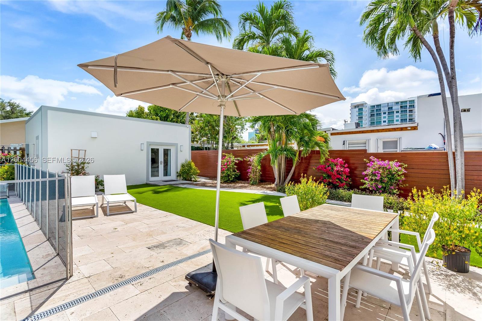 152 Southwest 20th Road Miami, FL 33129 - Photo 20 of 22 a view of outdoor space yard deck patio and outdoor kitchen