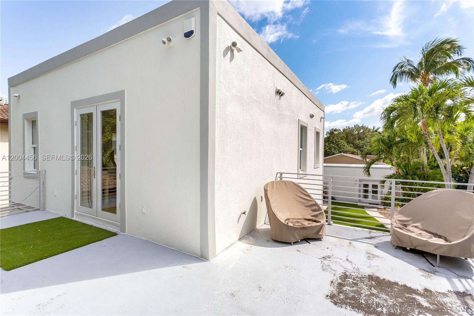 152 Southwest 20th Road Miami, FL 33129 - Photo 4 of 22 a view of livingroom with patio