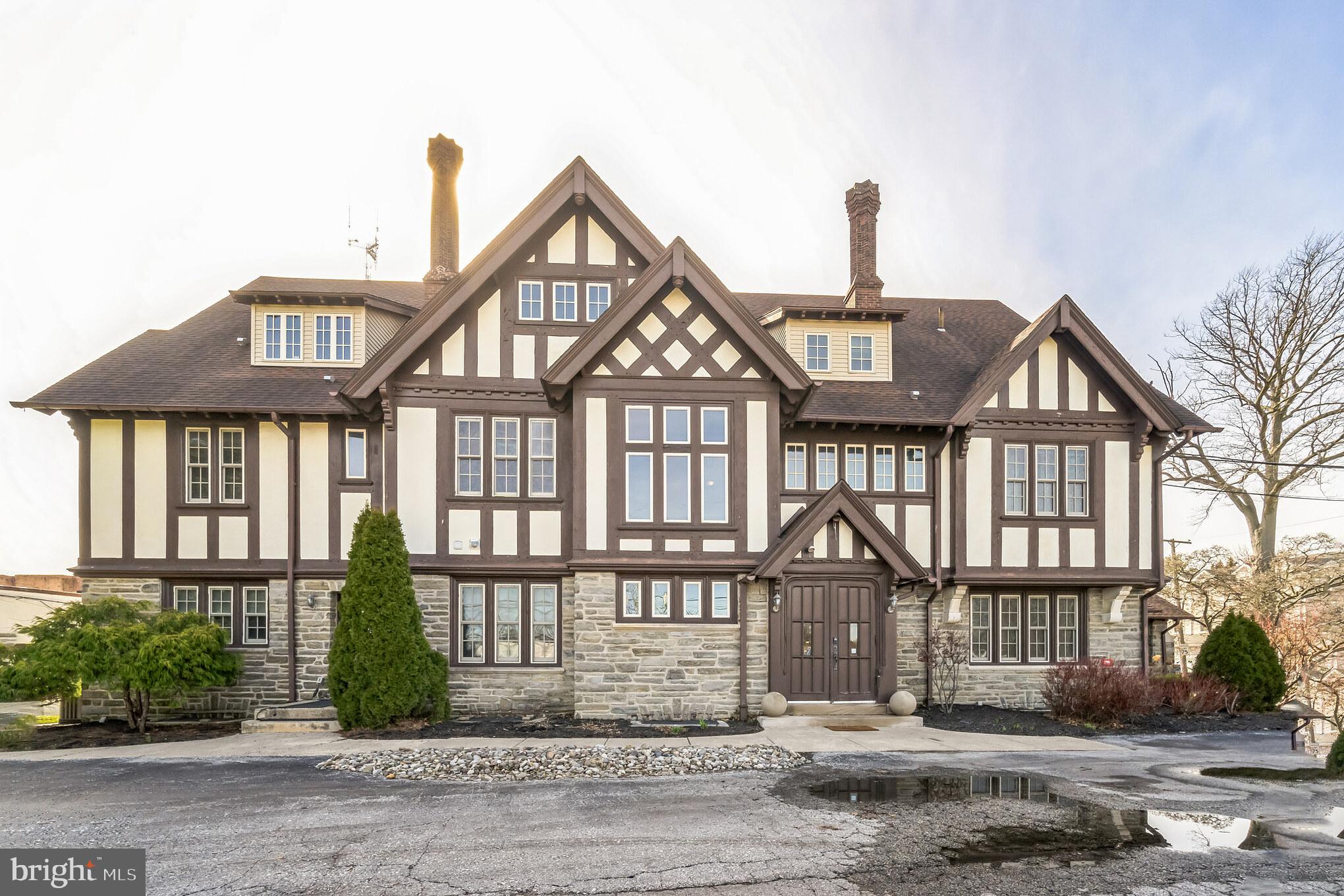 Circa 1860 stone tudor, formerly the Obert Mansion
