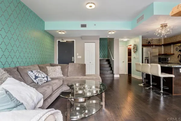 a view of a tall building and a yard