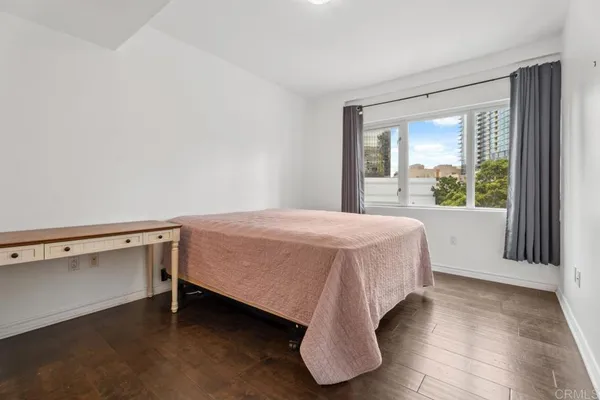 a view of an empty room with a closet