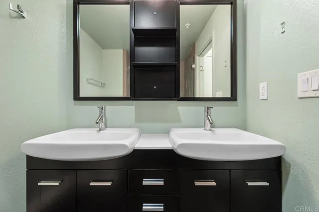 a view of a patio with table and chairs and potted plants