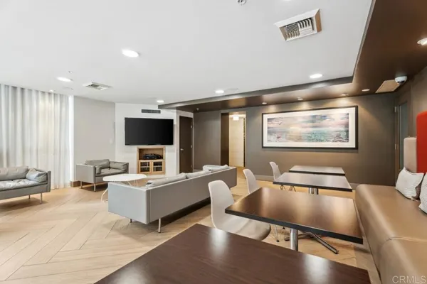 a view of a kitchen with granite countertop a sink and a stove