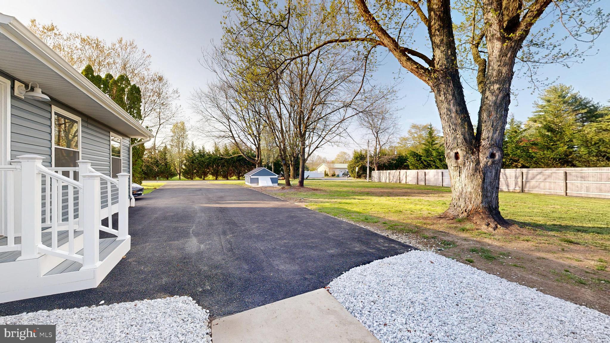 3318 Underwoods Corner Road Clayton, DE 19938 - Photo 30 of 54 a view of road with yard