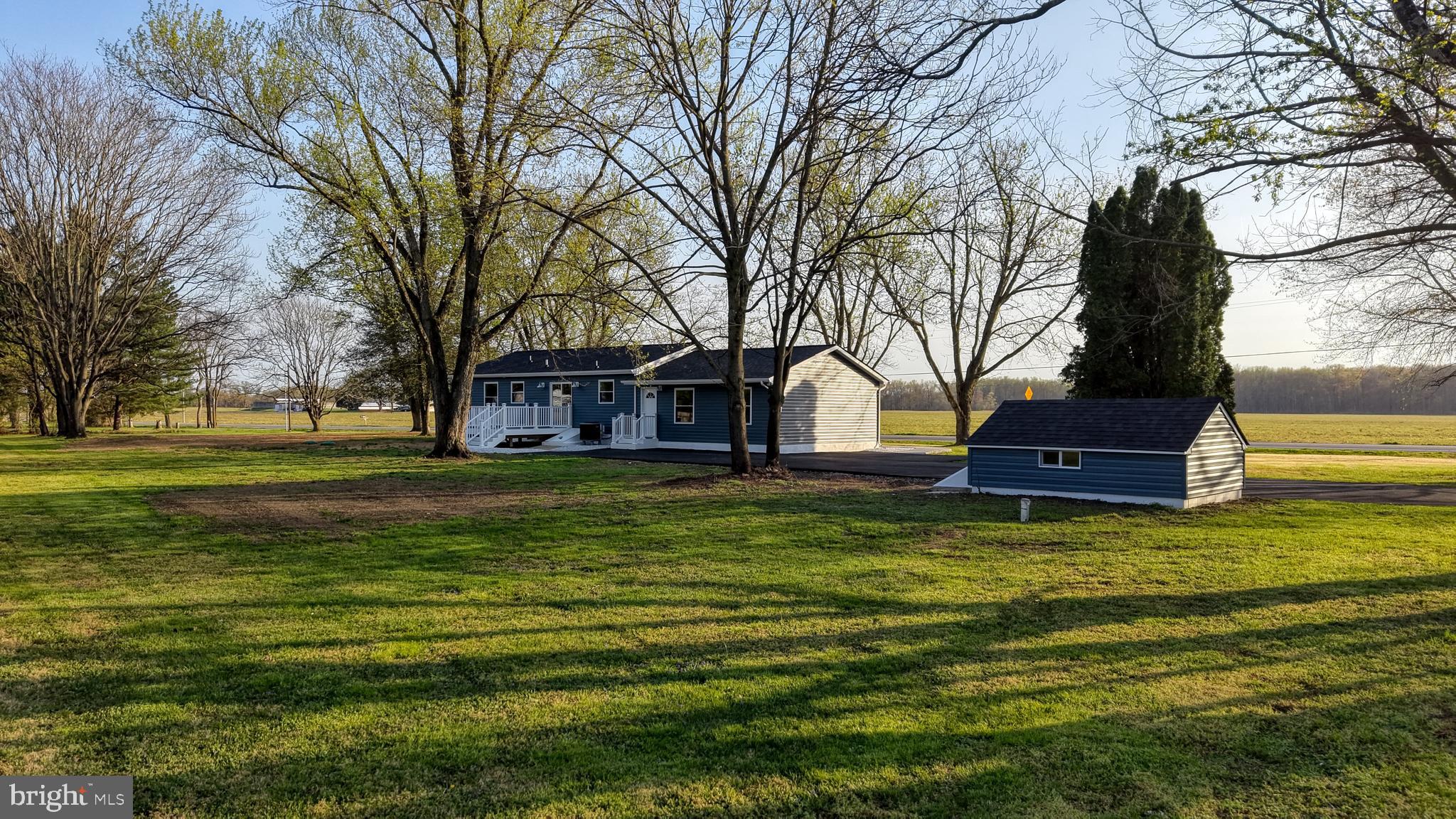 3318 Underwoods Corner Road Clayton, DE 19938 - Photo 39 of 54 a house view with swimming pool