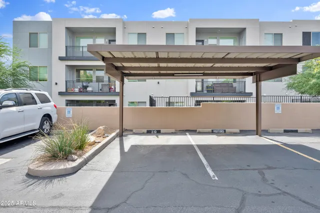 a view of a swimming pool with patio