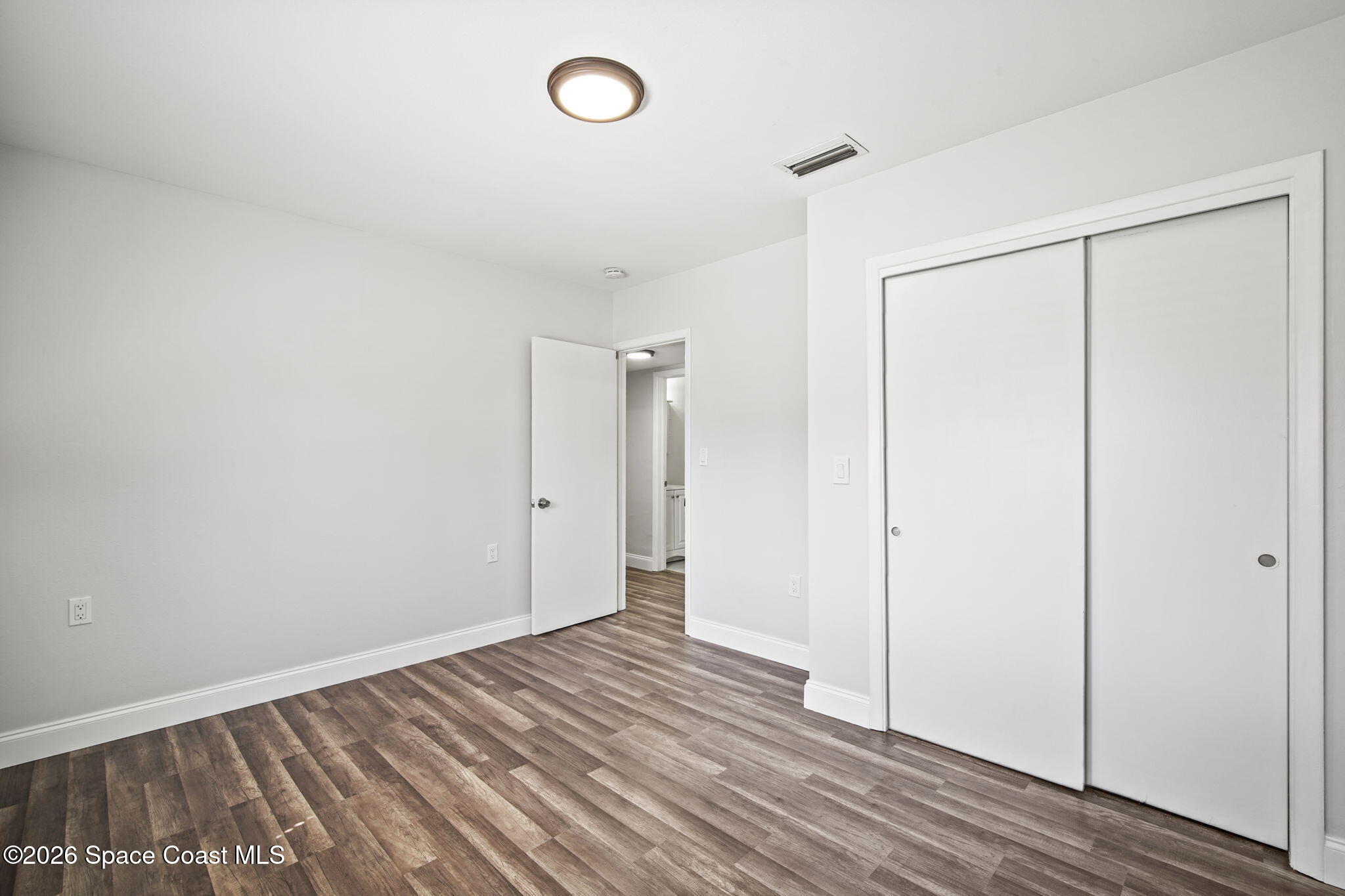 4665 Tuscarora Road Titusville, FL 32780 - Photo 23 of 34 a view of an empty room