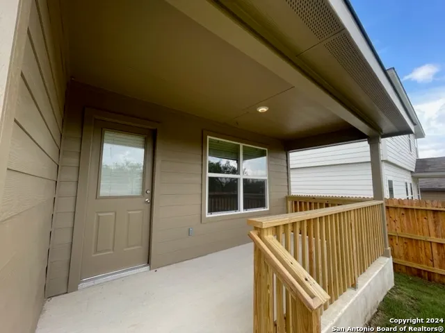 a view of outdoor space with deck and yard