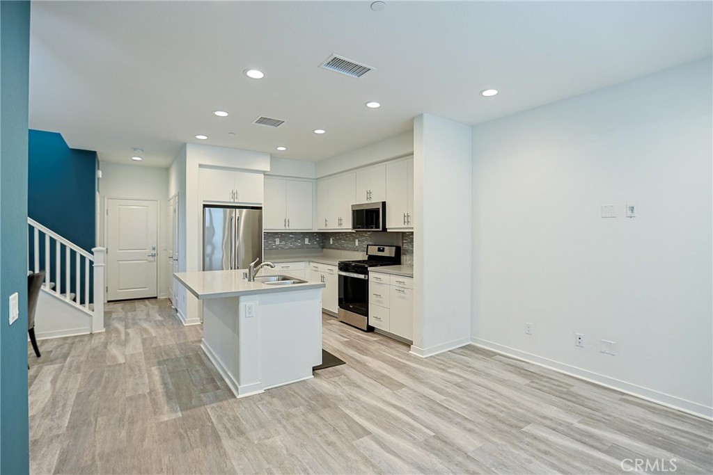 4260 Powell Way, Unit 110 Corona, CA 92883 - Photo 11 of 27 Kitchen and Living room