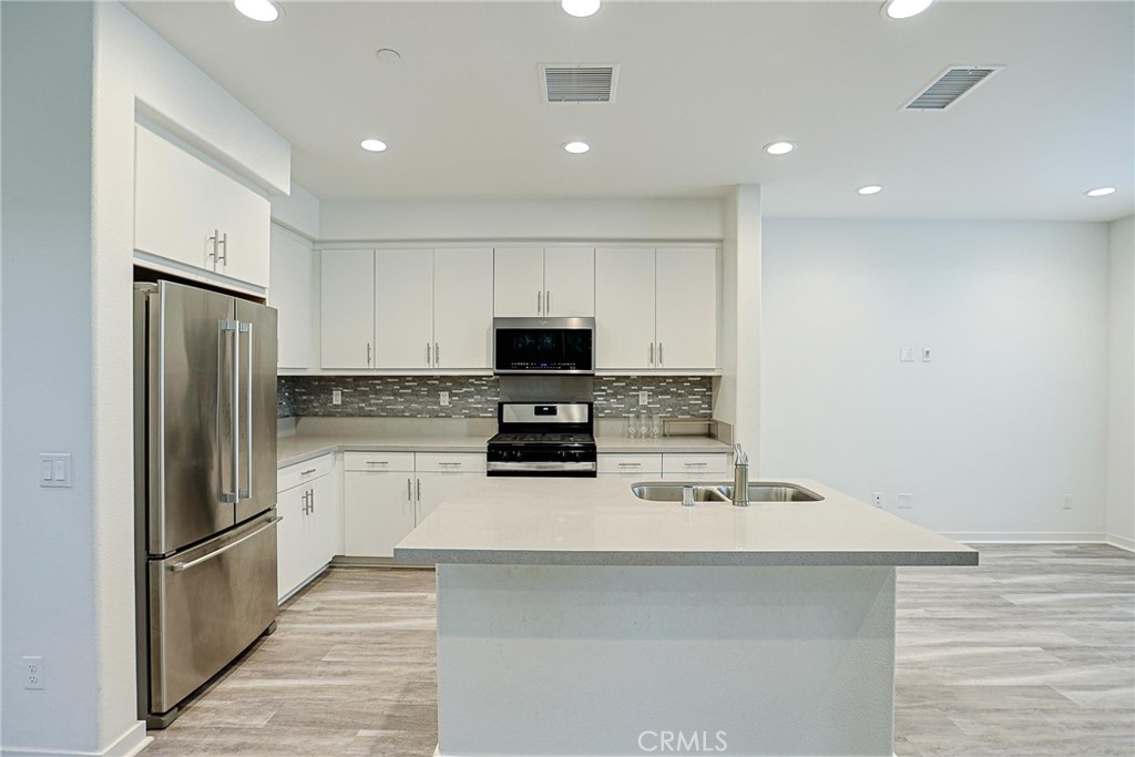 4260 Powell Way, Unit 110 Corona, CA 92883 - Photo 12 of 27 Kitchen from Dining room view