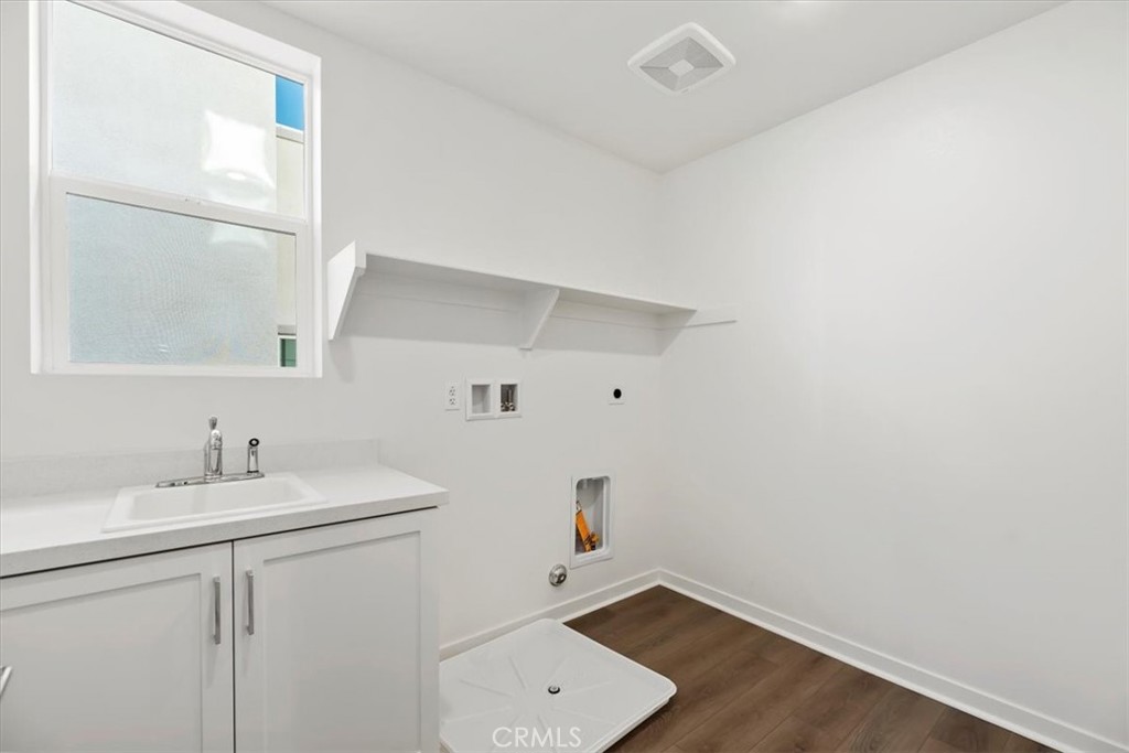 27323 Maverick Place Valencia, CA 91381 - Photo 12 of 18 a bathroom with a sink and a mirror