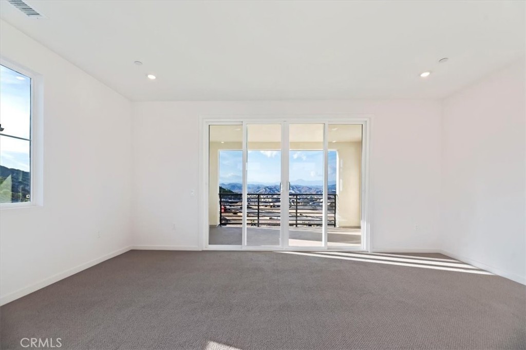 27323 Maverick Place Valencia, CA 91381 - Photo 13 of 18 an empty room with windows