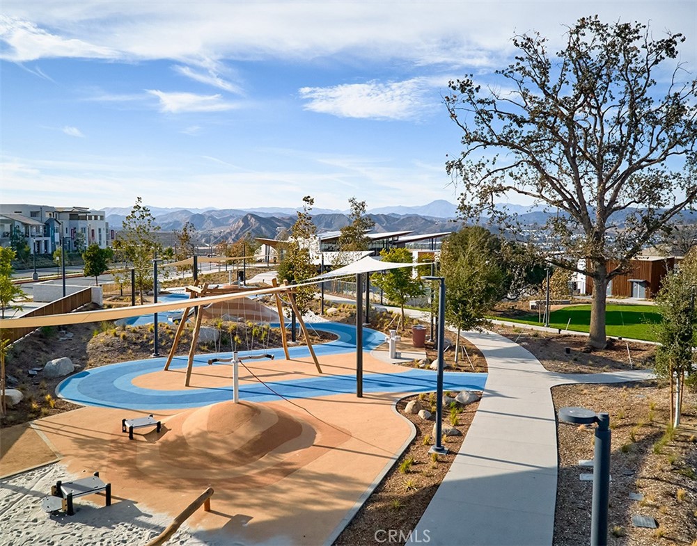 27323 Maverick Place Valencia, CA 91381 - Photo 17 of 18 a view of a swimming pool with lounge chairs
