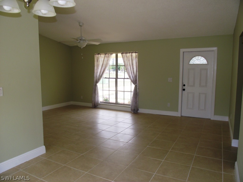 1085 Ridgeway Drive North Fort Myers, FL 33903 - Photo 11 of 25 a view of an empty room with a window