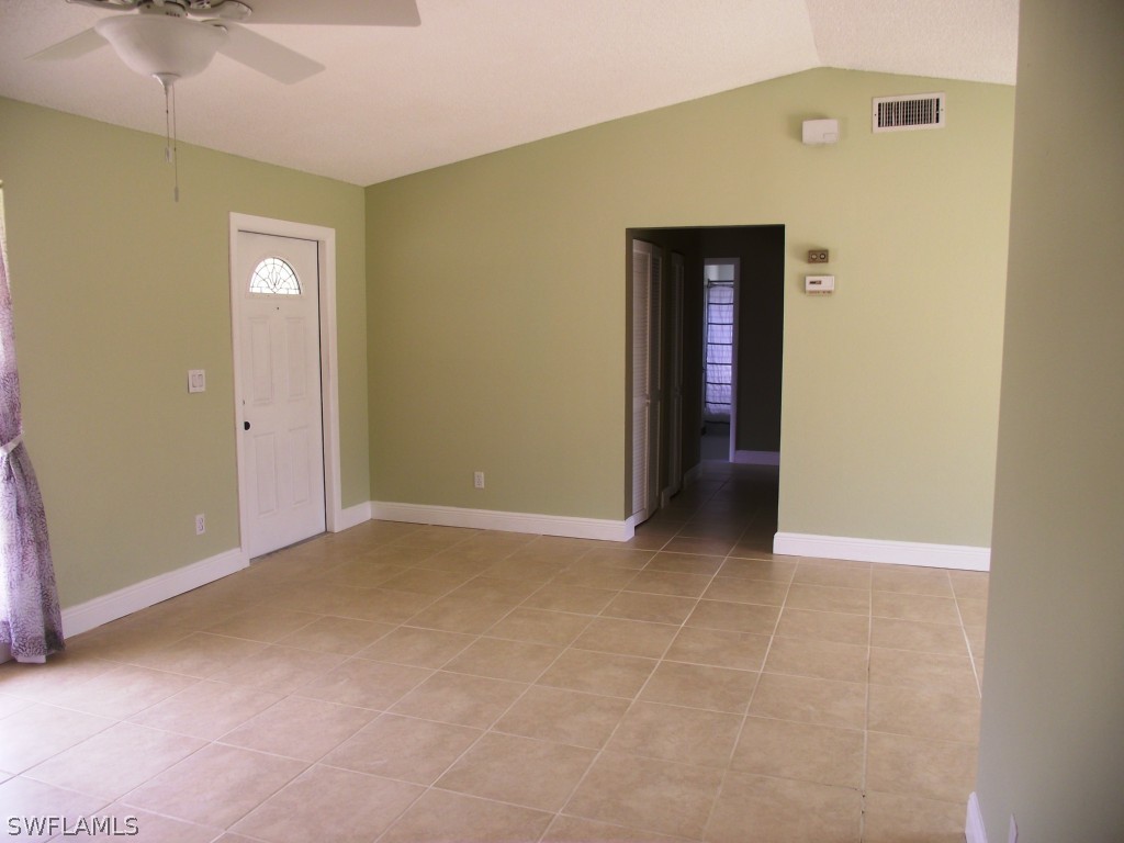 1085 Ridgeway Drive North Fort Myers, FL 33903 - Photo 12 of 25 an empty room with windows