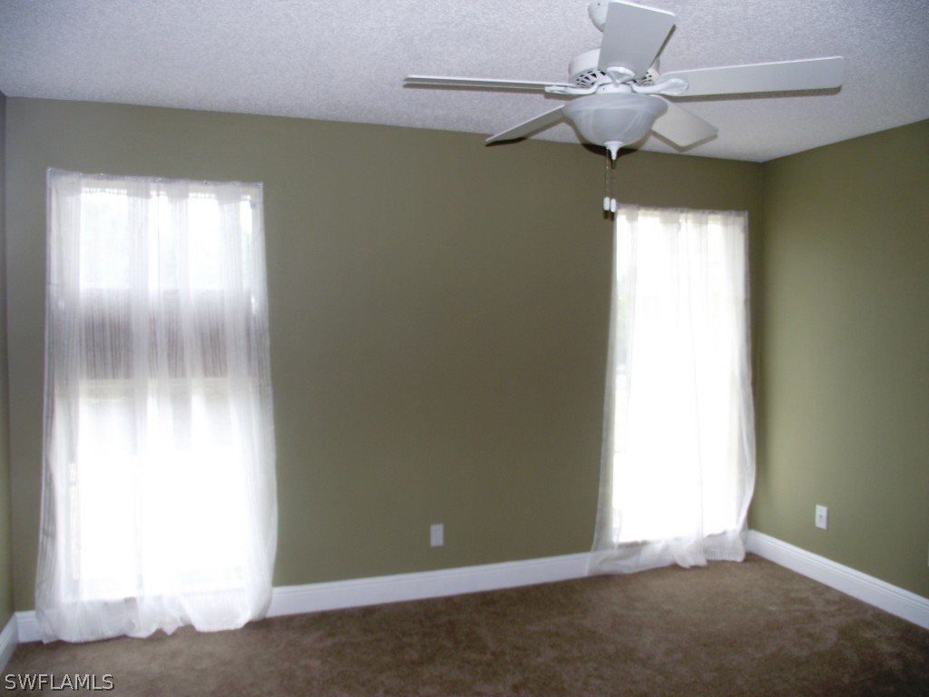 1085 Ridgeway Drive North Fort Myers, FL 33903 - Photo 16 of 25 a view of empty room with window
