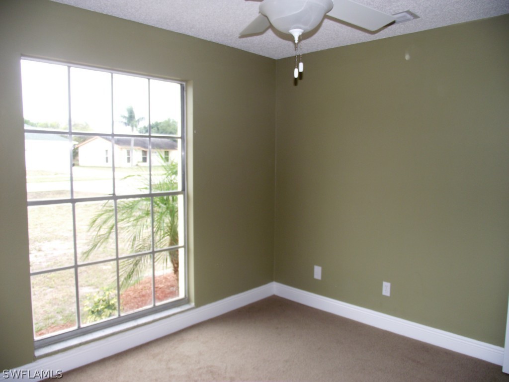 1085 Ridgeway Drive North Fort Myers, FL 33903 - Photo 21 of 25 an empty room with a window