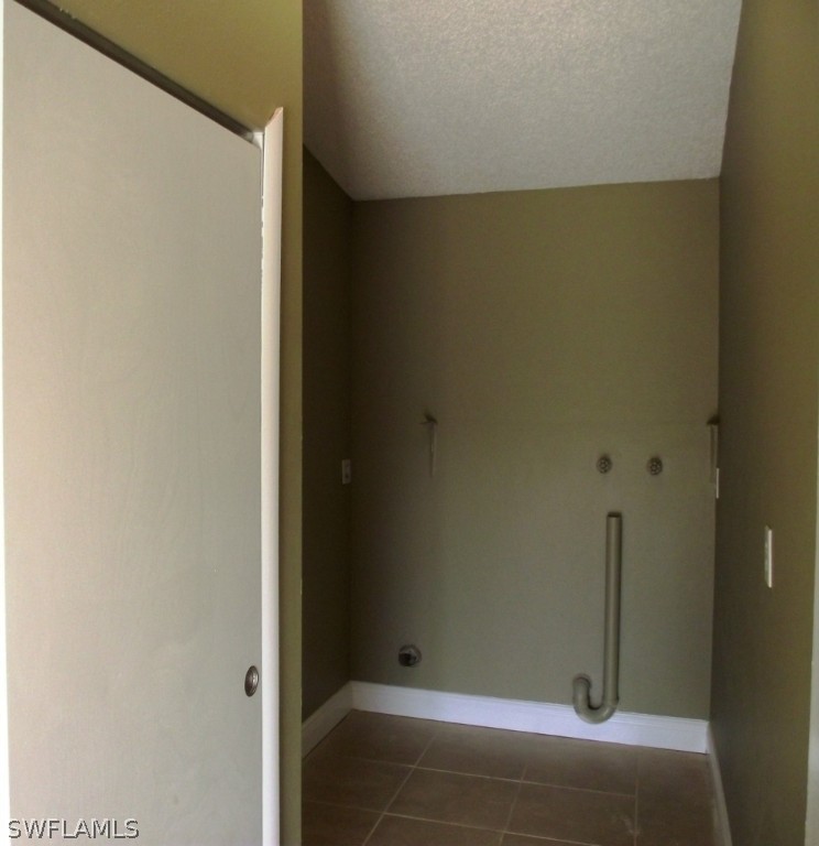 1085 Ridgeway Drive North Fort Myers, FL 33903 - Photo 25 of 25 a bathroom with a glass door