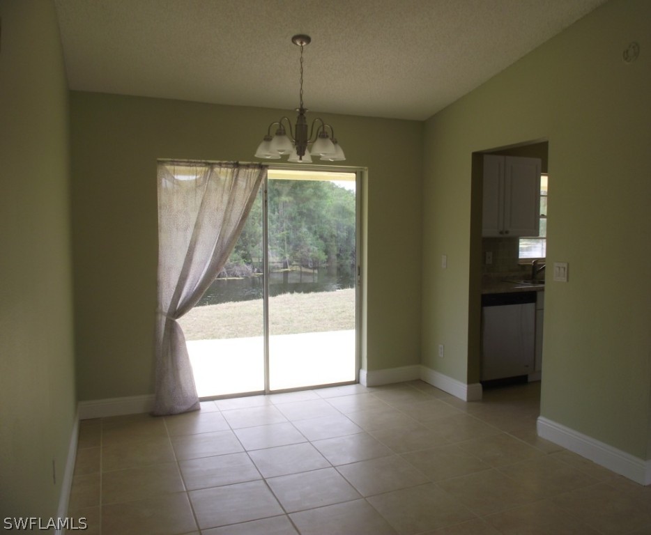 1085 Ridgeway Drive North Fort Myers, FL 33903 - Photo 6 of 25 a view of an empty room with a window