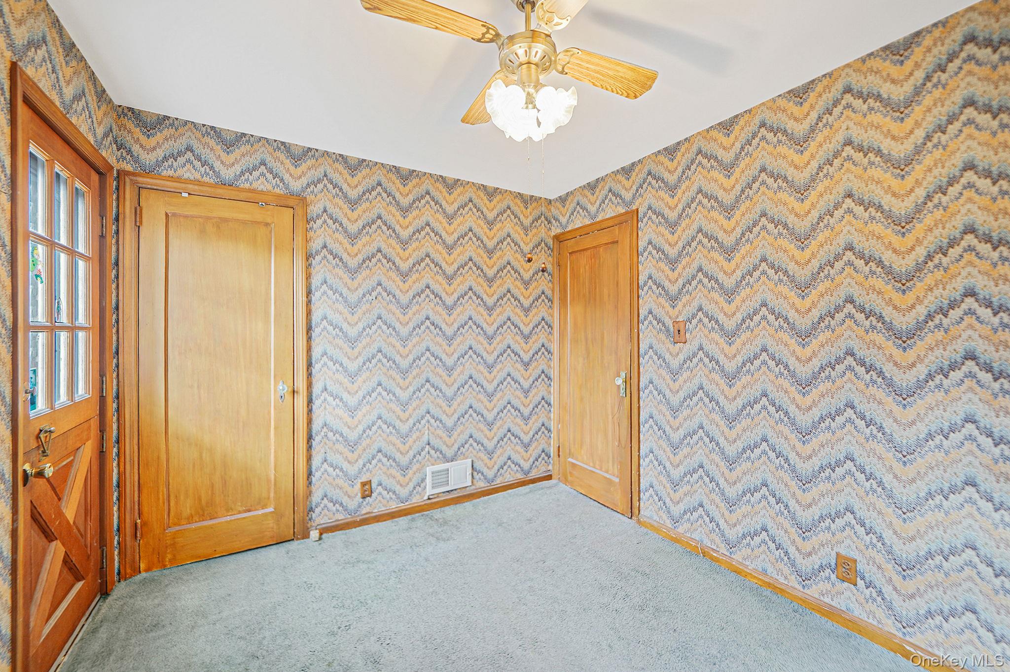 15 Berkshire Road Merrick, NY 11566 - Photo 6 of 11 wooden floor in an empty room