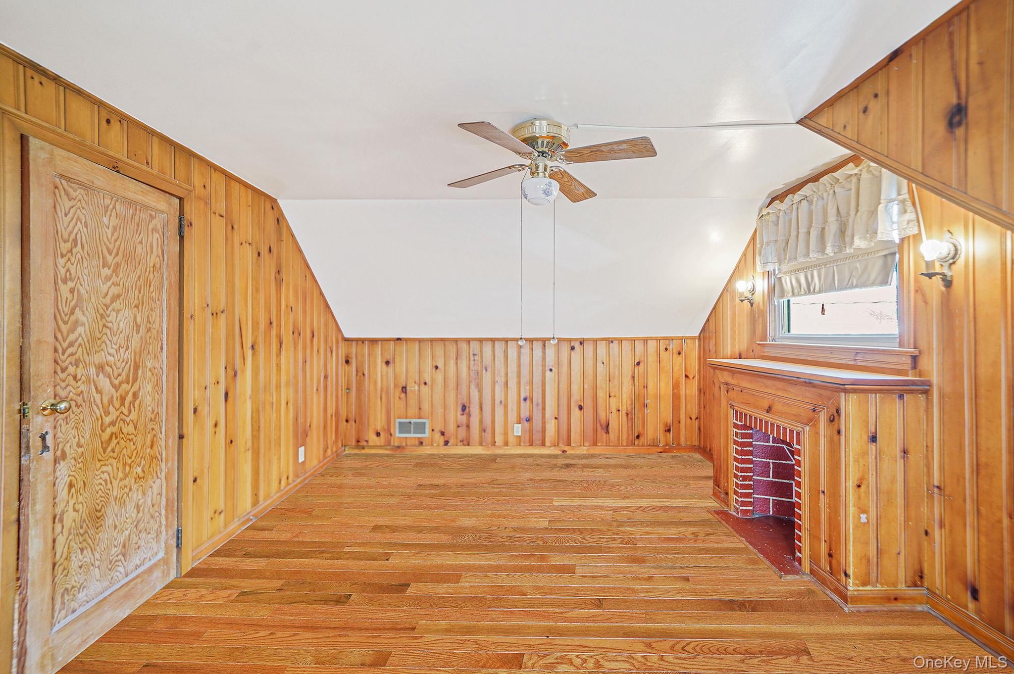 15 Berkshire Road Merrick, NY 11566 - Photo 8 of 11 a view of entryway with wooden floor
