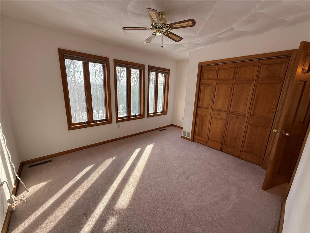 1509 Ray Road Penn Run, PA 15765 - Photo 15 of 33 a view of a livingroom with a ceiling fan and window