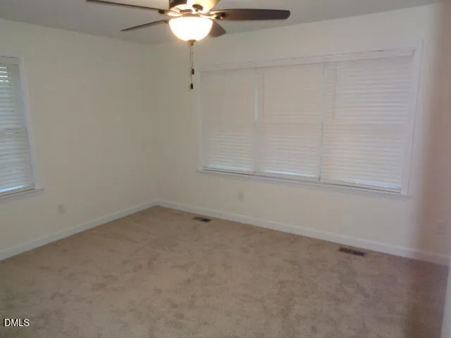 a view of backyard of a house