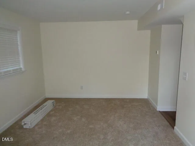 a white toilet sitting next to a sink