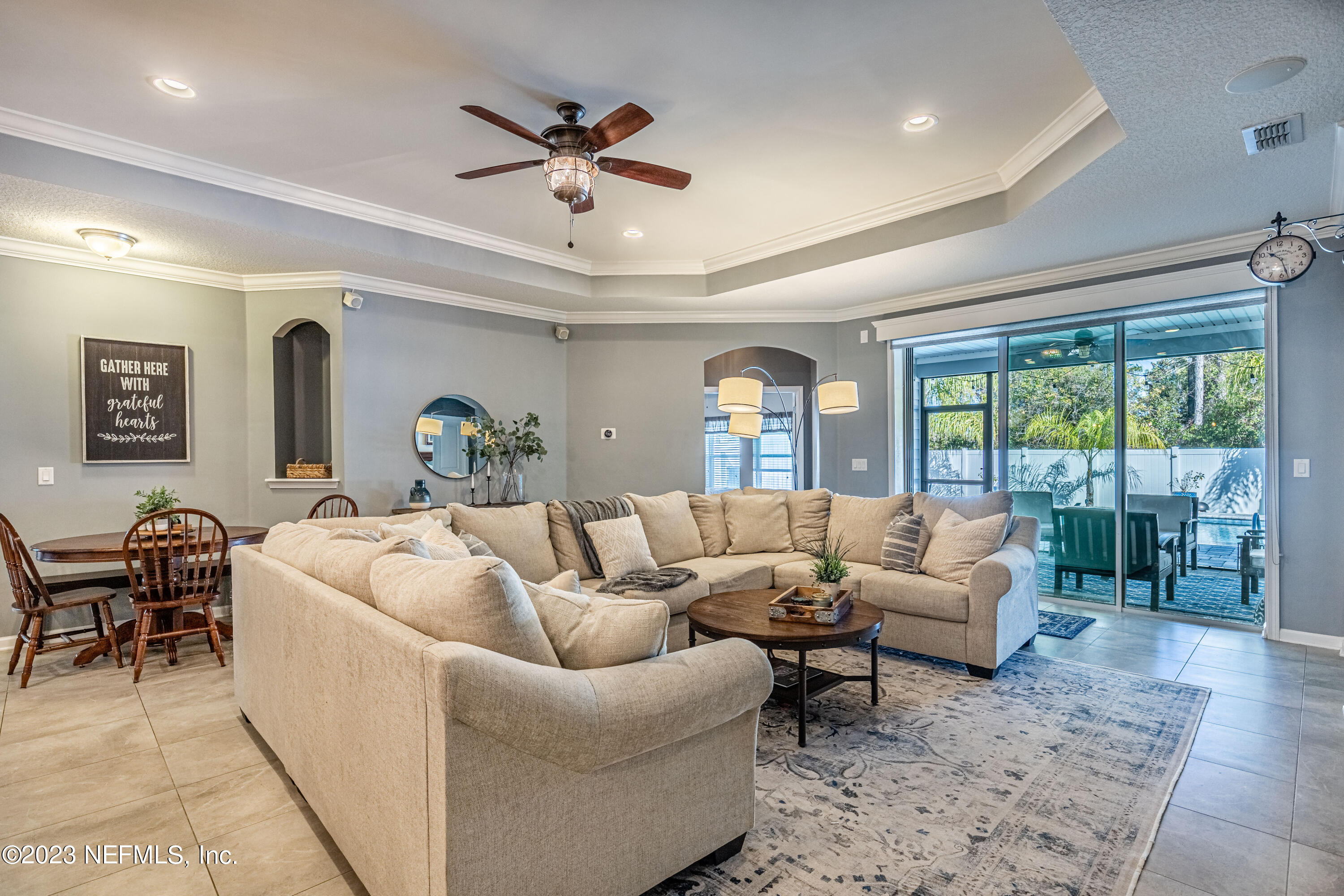 871 Bent Creek Drive St. Johns, FL 32259 - Photo 21 of 71 a living room with furniture and a large window