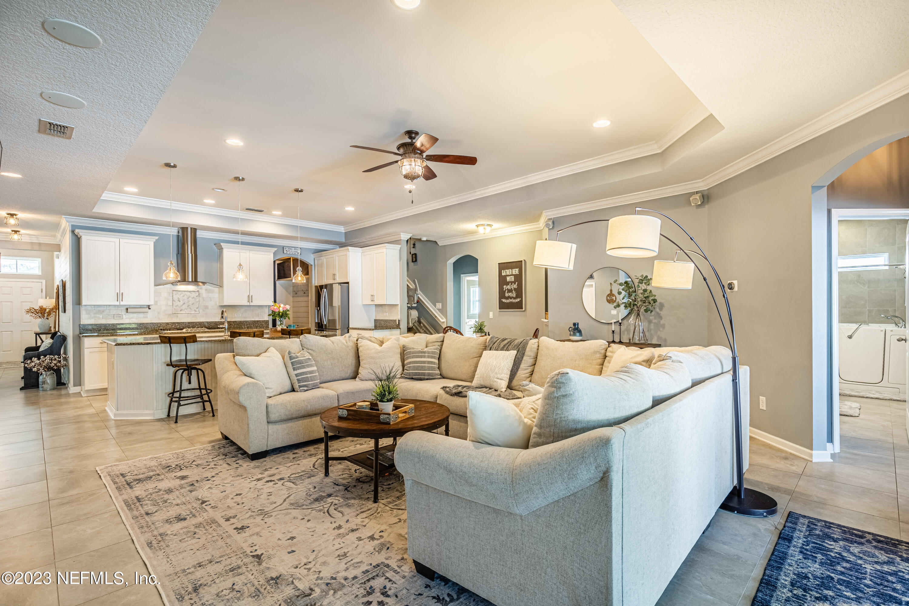871 Bent Creek Drive St. Johns, FL 32259 - Photo 22 of 71 a living room with furniture and a large window