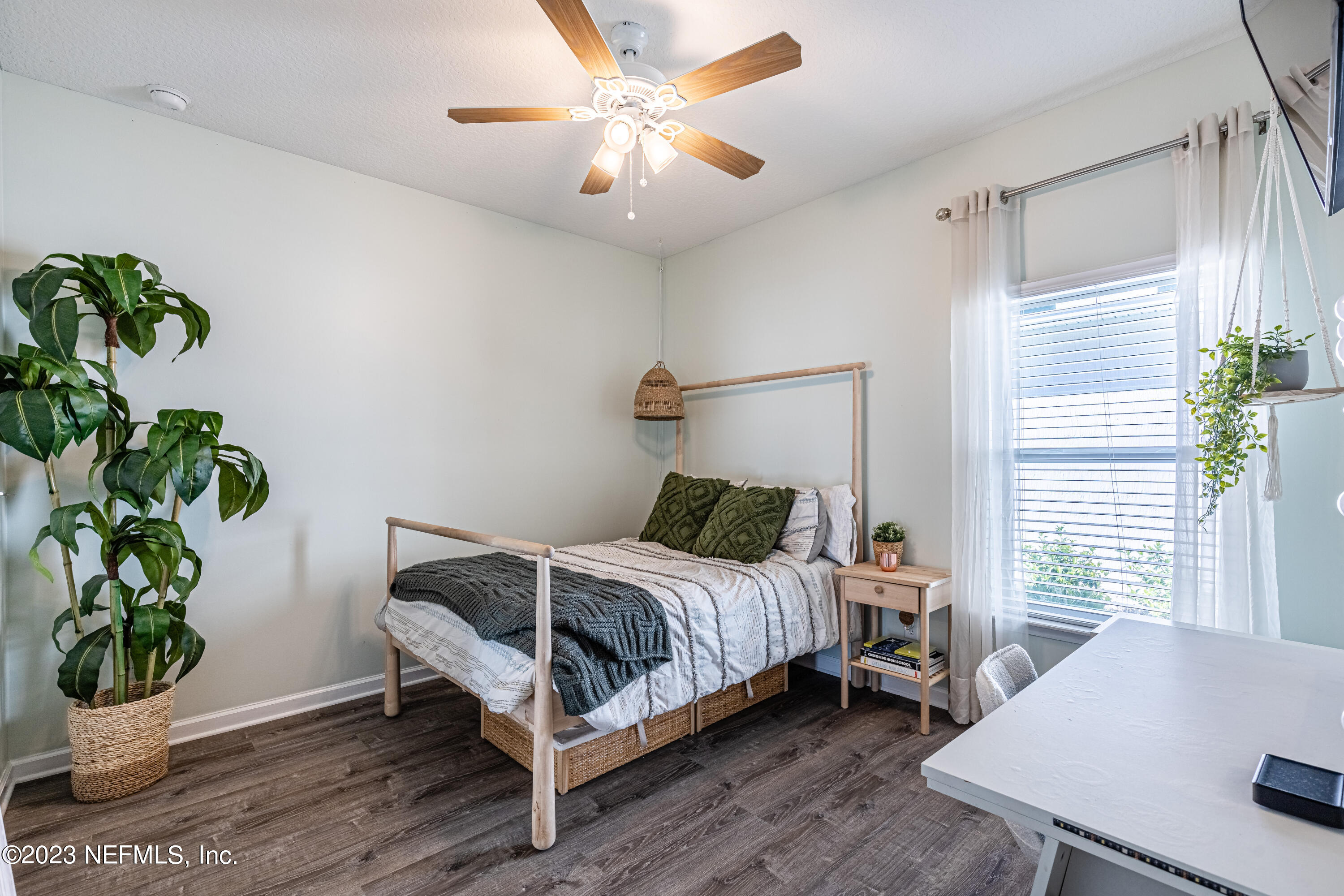 871 Bent Creek Drive St. Johns, FL 32259 - Photo 41 of 71 a bedroom with a bed table and a window
