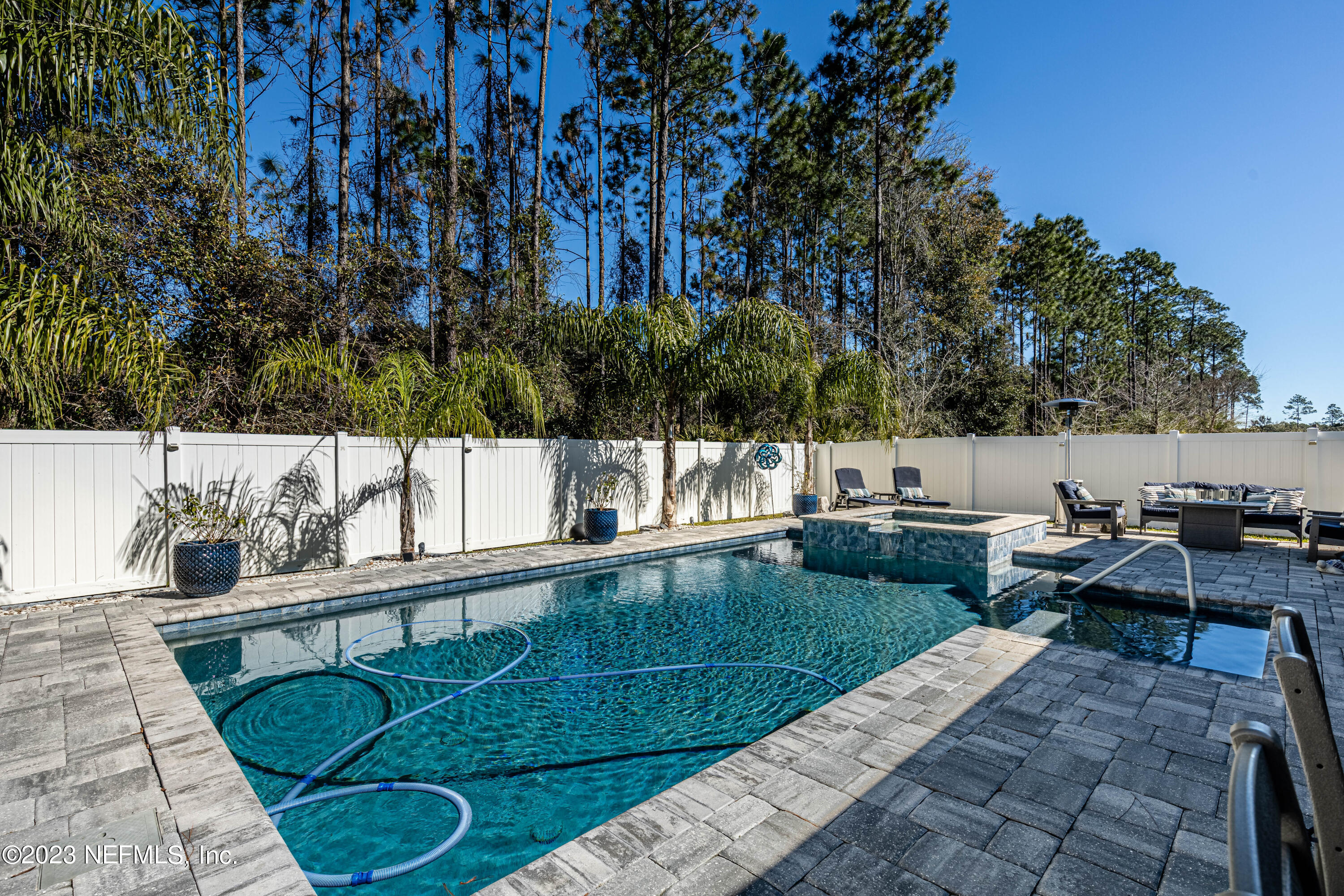 871 Bent Creek Drive St. Johns, FL 32259 - Photo 56 of 71 a view of swimming pool with chairs in patio
