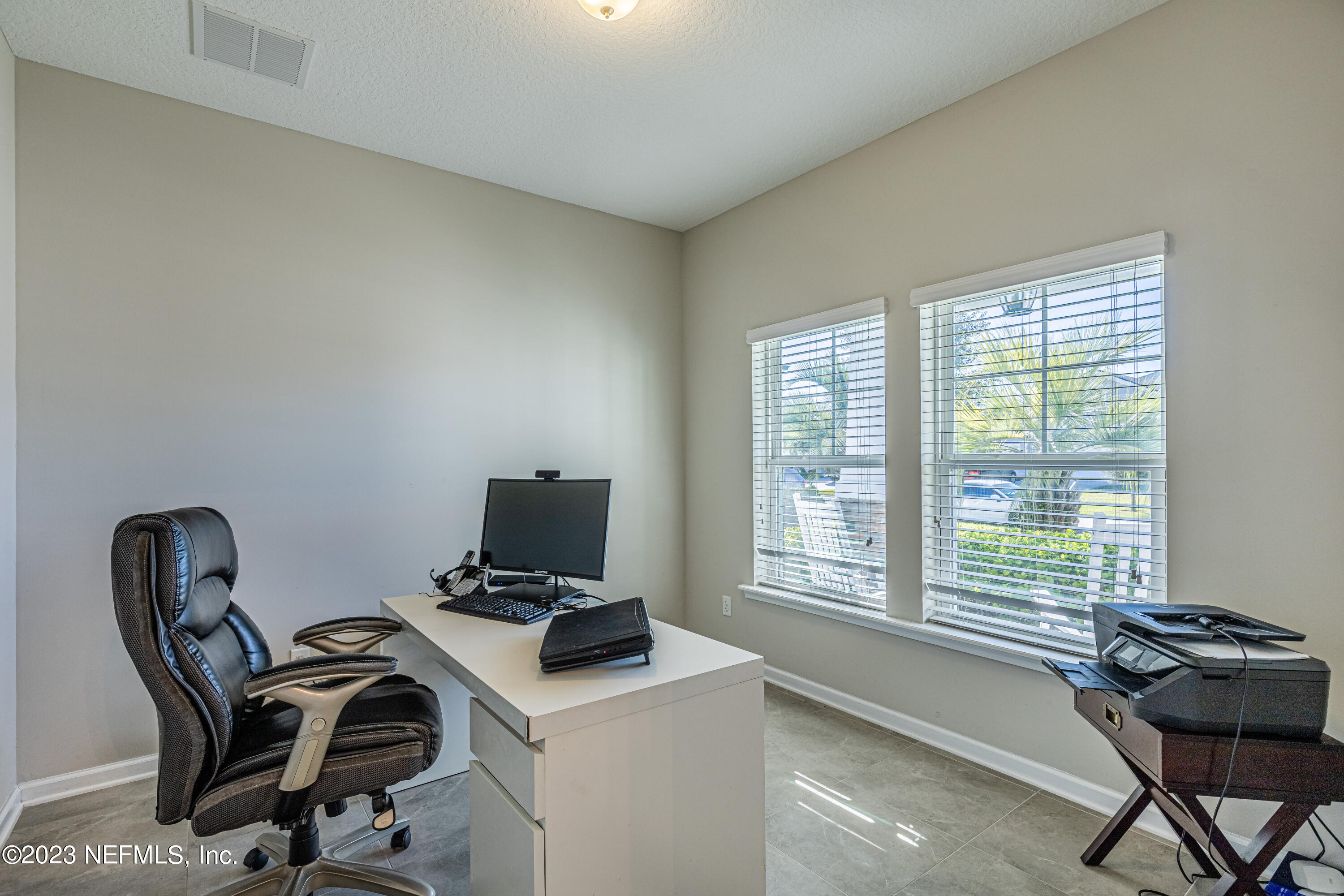 871 Bent Creek Drive St. Johns, FL 32259 - Photo 6 of 71 a view of workspace with furniture and window