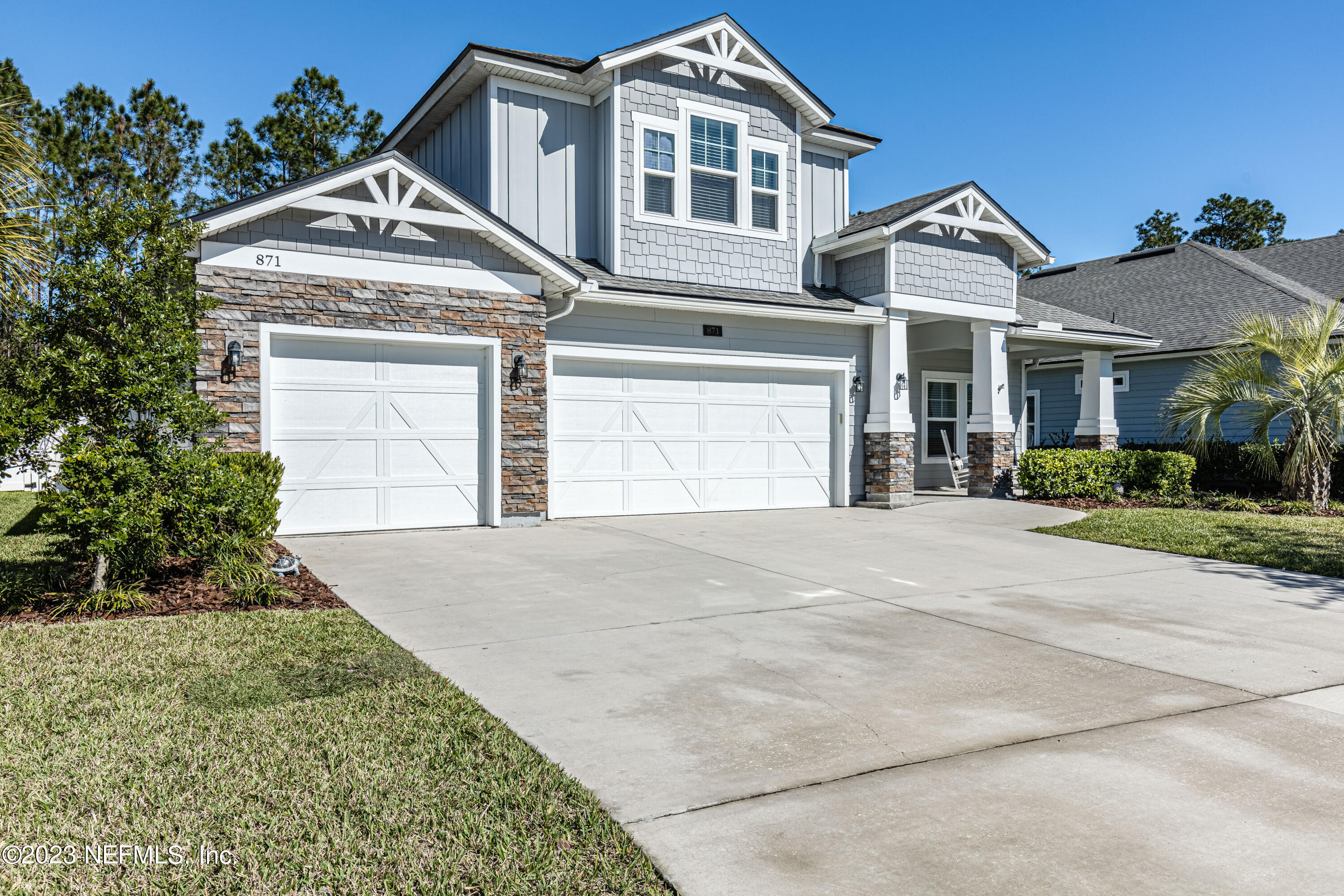 871 Bent Creek Drive St. Johns, FL 32259 - Photo 61 of 71 front view of a house with a yard