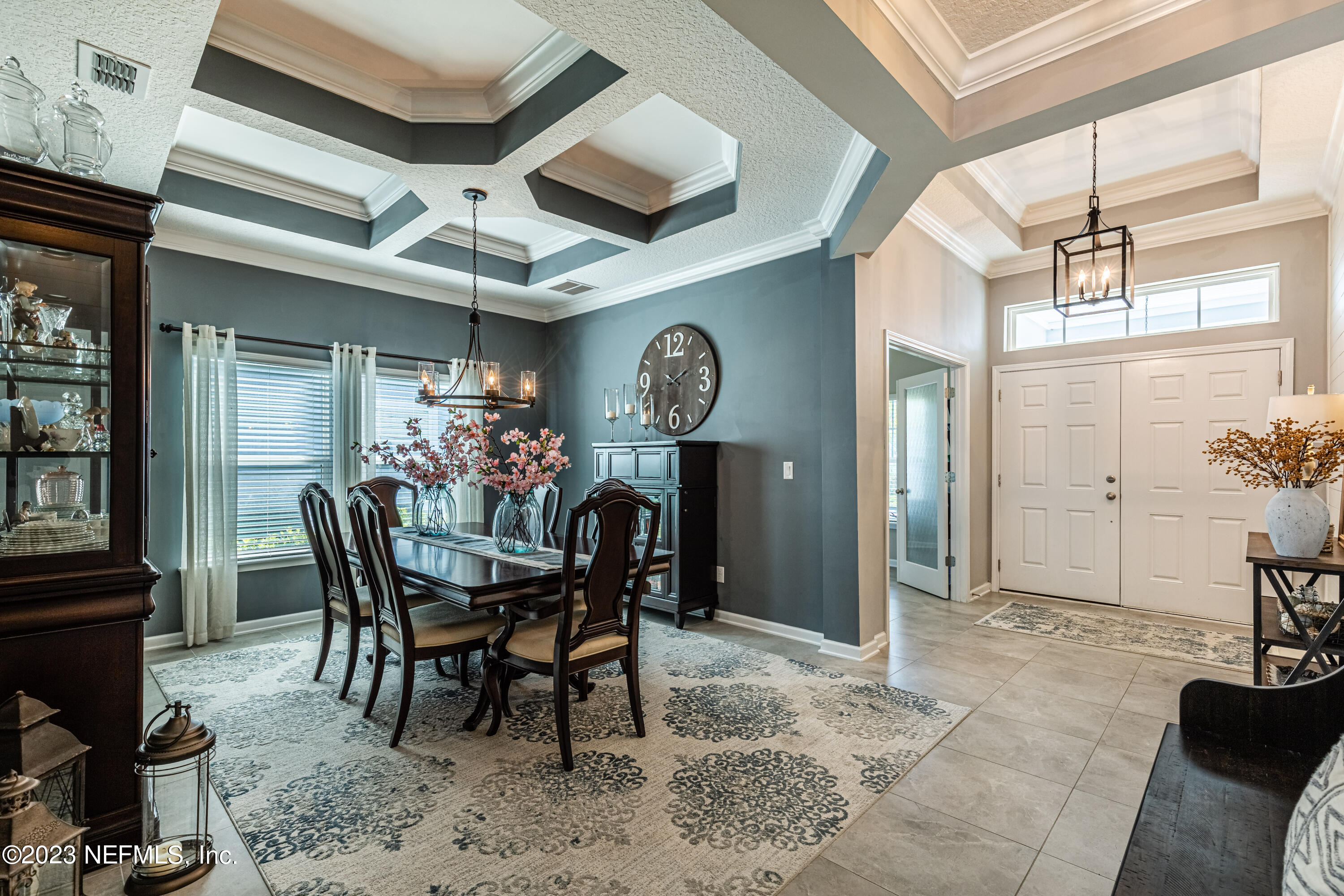 871 Bent Creek Drive St. Johns, FL 32259 - Photo 7 of 71 a view of a dining room with furniture and a chandelier