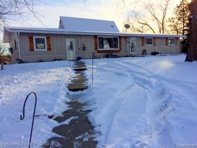 18075 Gregory Road Gregory, MI 48137 - Photo 2 of 33 a.Winter front of home